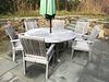 Gloster Teak Wood Round Dining Table and Six Armchairs