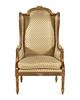 A Louis XVI Style Carved Giltwood Bergere a Oreilles