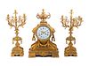 A Napoleon III Gilt Bronze Clock Garniture
