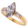 Ring in 18k gold and palladium silver with a marquise cut diamond ~1.50 ct. Clarity: SI1. Color: K