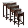 Set of 4 nesting tables. Chinese style. 20th century. Carved, openwork wood, with applications in resin and polychromy.