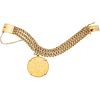 WRISTBAND WITH DEMONETIZED COIN. 21.6K, 18K AND 14K YELLOW GOLD
