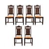 Lote de 6 sillas. Francia. Siglo XX. Estilo Bretón. En talla de madera de roble Con respaldos semiabiertos y asientos de palma.