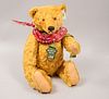 Musical Toy Bear. Germany. 20th century. Steiff. Plush toy. Series number 01644. With button and brand label.