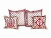 Four Red and White Figural Silk Pillows