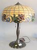 Leaded glass table lamp on bronze Handel-style base with acorn pulls, ht. 21 1/2", shade dia. 16".