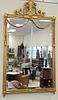Pair of large majestic mirrors, gilt frames with carved tassel decoration, 48" x 27".