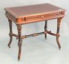 Eastlake writing table having tooled leather top, ht. 30 1/2", top 22" x 36".