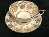 Paragon porcelain White and Gold Cup and saucer made in England