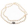 A Long Strand of Pearls with Diamond Clasp