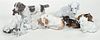 Nine Assorted Porcelain Dog Figures