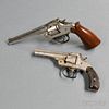 Smith & Wesson 32, and an Iver Johnson .22 Caliber Revolver