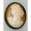 A DIVISION ONE OVAL CAMEO CARVED BUTTON