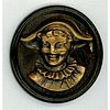 A DIVISION ONE BRASS AND WOOD BUTTON DEPICTING A JESTER