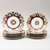 Set of Twelve Austria Gilt Decorated Porcelain Plates in the 'Alhambra' Pattern