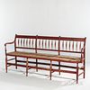 Red-painted Windsor Bench