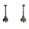 Pair of candleholders. 20th century. Polychrome wood carving, floral washers, compound shafts, bun-style supports.