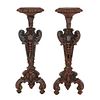 Pair of candleholders. 20th century. Polychrome wood, circular covers, composite shafts.