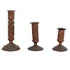Lot of 3 candlesticks. 20th century. Hammered copper, circular washers, compound shafts.