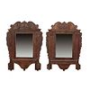 Pair of mirrors. 20th century. Wood. Decorated with plant, floral, organic elements. 58.2 x 42 x 5.9" (148 x 107 x 15 cm)