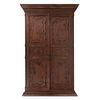 Wardrobe. 20th century. Carved in wood. Two folding doors with handles and base support.