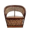 Equipal. 20th century. In wood. Semi-open wicker backrest and brown leather-like seat. Decorated with interwoven elements.