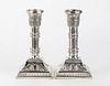 A pair of Neoclassical style silver 835/1000 candlesticks - early 20th Century