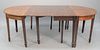 Custom mahogany three-part dining table, ht. 30", size open: 48" x 90". Estate of Thomas Izard.