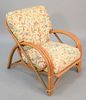 Mid-Century bamboo bentwood armchair with upholstered cushions.