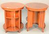 Pair of contemporary side tables having shelving built into body, ht. 30", dia. 26".Estate of Marilyn Ware Strasburg, PA.