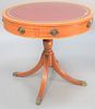 Kittinger drum table having leather top and pedestal base, ht. 29", dia. 32".