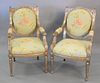 Pair of silvered upholstered open armchairs, ht. 40", wd. 24".