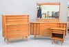 Four-piece Mid-Century bedroom set to include long chest, lg. 64" with mirror, five drawer tall chest along with a nightstand.