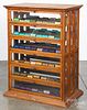 A.N. Russell oak ribbon cabinet