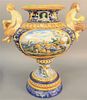 Large Majolica figural urn having mythical faun on each side (repaired), ht. 24", wd. 23".