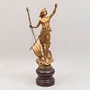 Escultura de Musa. Siglo XX. Elaborada en metal dorado, sobre base de madera. Sobre la proa de un barco, tomada de la vela.