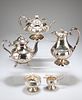A GROUP OF SILVER, comprising a Victorian silver hot water jug,?Thomas Russ