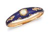 A 19TH CENTURY PEARL AND ENAMEL BANGLE, the tapering bangle set to centre w