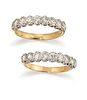 A PAIR OF 18CT DIAMOND HALF ETERNITY RINGS, each ring with nine round brill