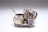 A CHINESE EXPORT CRUET SET, comprising three silver condiments, possibly by
