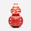 Chinese, white Peking glass 'Prosperity' vase with red overlay