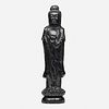 Chinese, Large spinach green jade figure of Guanyin