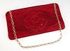 Chanel Red Satin Climate Clutch, c. 1990, with stitched and red rhinestone rose decoration, the zip closure opening to a red satin...