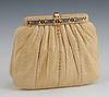 Judith Leiber Ivory Snake Skin Evening Bag, c. 1980, the two-tone snap closure opening to a satin lined interior with two side pocke...