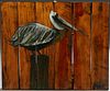 Louisiana School, "LSU Pelican," 20th c., watercolor, on reclaimed pine boards, signed indistinctly lower right, titled verso, unfra...