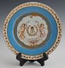 French Sevres Style Cabinet Plate, 19th c., with gilt and putti decoration, around an "LP" monogram, with a gilt leaf border around a heavenly blue ba
