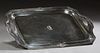 Sterling Silver Tea Tray, c. 1925, by Reed and Barton, in the "Heritage" pattern, #940C, circa 1925, the curved corner rectangular well, flanked by sh