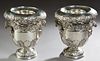 Pair of Large Ornate Silver Plate Wine Coolers, 20th c., of cylindrical form, the handles with relief faces of Pan, with relief grape bunch and leaf d
