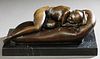 After Ferdinand Preiss (1882-1943), "Sleeping Nude," 21st c., patinated bronze on a black marble base, signed verso, H.- 5 3/4 in., W.- 13 in., D.- 7 