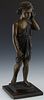 After Auguste Moreau (1861-1906), "Boy With a Seashell," late 20th c., patinated bronze, on a figured black marble base, H.- 22 1/4 in., W.- 10 in., D